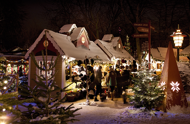picture of  a Christmas stall in Tivoli with Christmas lights