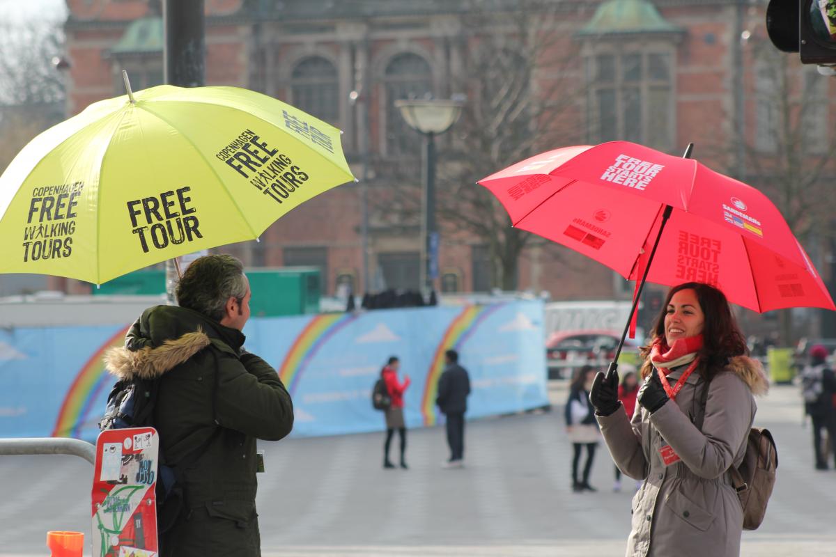 picture of umbrella with free tours written on it